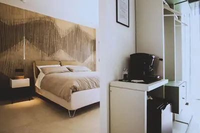 Letto o letti in una camera di Casa Amerì affittacamere