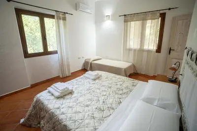 Letto o letti in una camera di Casa Iriai