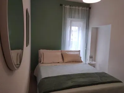 Letto o letti in una camera di Casa Mariangela