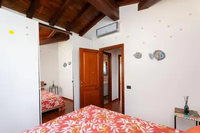 Letto o letti in una camera di Villetta Monica