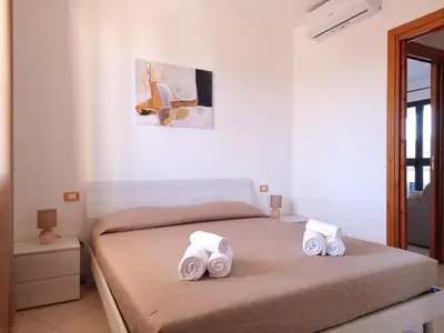 Letto o letti in una camera di Casa Vecchio Mulino