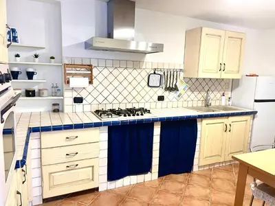 Cucina o angolo cottura di Appartamento Blue IUN T1261