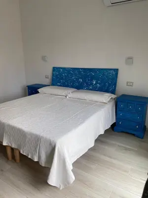 Letto o letti in una camera di Ajo' da Paolo