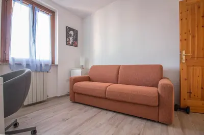 Area soggiorno di GuestHost - Olbia Oasis Apartment W Two Balconies!
