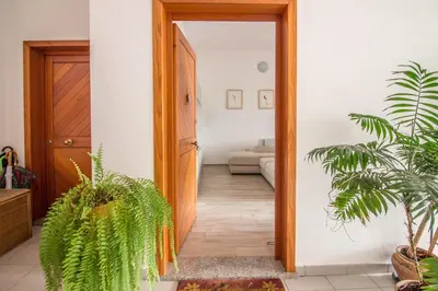 Letto o letti in una camera di GuestHost - Olbia Oasis Apartment W Two Balconies!
