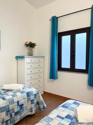 Letto o letti in una camera di Appartamenti Sa Codula IUN R8525