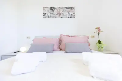 Letto o letti in una camera di Villa Marianna