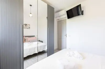 Letto o letti in una camera di Villa Marianna