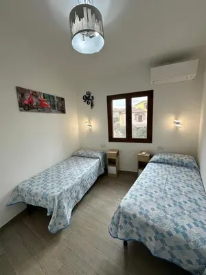 Letto o letti in una camera di Posada Apartments