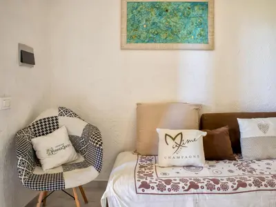 Letto o letti in una camera di Apartment D4 - I1- Baia de Bahas by Interhome