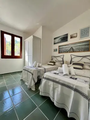 Letto o letti in una camera di Villa Peru