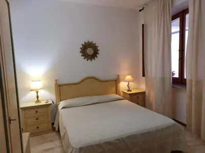 Letto o letti in una camera di CASA Frau