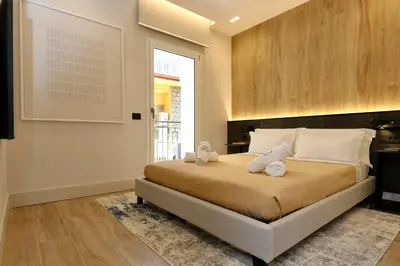 Letto o letti in una camera di Luxurious 1BR Apartment - Historical Centre - Fully Equipped & Renovated - Garibaldi#3