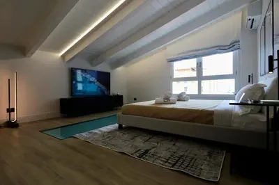Letto o letti in una camera di Luxurious Garibaldi Penthouse - Big Terrace - Great view - Renovated - Historical Centre