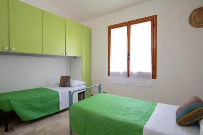 Letto o letti in una camera di Casa del Gelsomino by Wonderful Italy