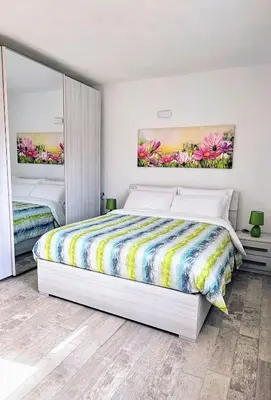 Letto o letti in una camera di Serendipity, La Caletta