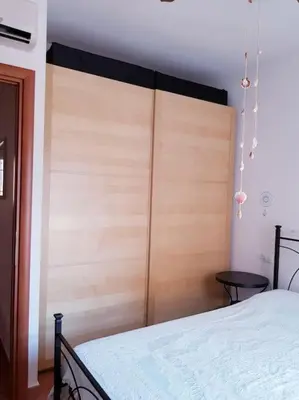 Letto o letti in una camera di Rilassarsi a Orosei