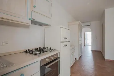 Cucina o angolo cottura di Superb Le Residenze del Golfo di Orosei 1 Bedroom apartment for 4 people