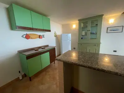 Cucina o angolo cottura di Casa Punta Ruinas