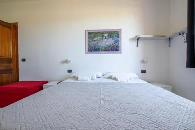 Letto o letti in una camera di Dobby's House