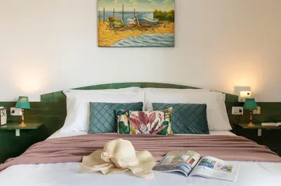 Letto o letti in una camera di La Terrazza sul Mare