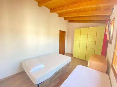 Letto o letti in una camera di Pettirosso 6