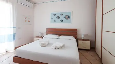 Letto o letti in una camera di Sunny House