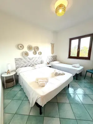 Letto o letti in una camera di Casa CLELIA