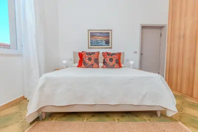 Letto o letti in una camera di Splendido Appartamento in centro a Padru