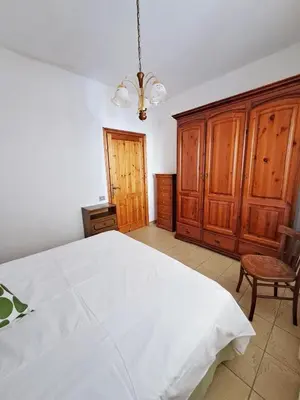 Letto o letti in una camera di Casa Verdi
