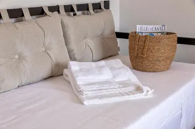 Letto o letti in una camera di Casa Ginestra