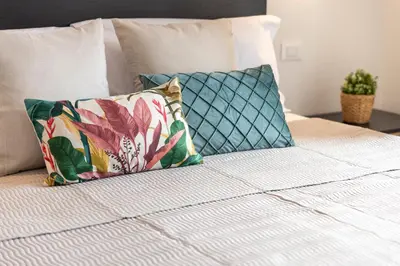 Letto o letti in una camera di Casa Ginestra