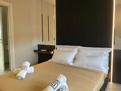 Letto o letti in una camera di Luxurious High-End 2BR Penthouse - Terrace - Great view - Parking - Historical Centre