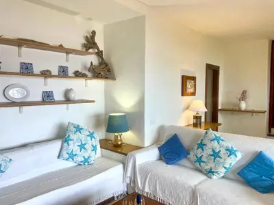 Letto o letti in una camera di Punta Est Quadrilocale Vista Mare