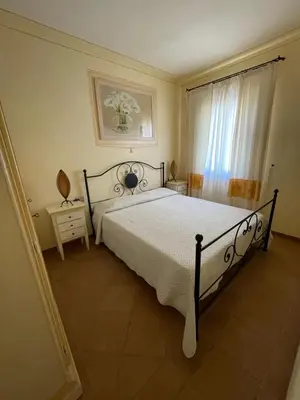 Letto o letti in una camera di Appartamento le querce