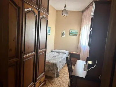 Letto o letti in una camera di City House Nardina