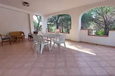 Balcone o terrazza di VILLA PIETRAMARINA CALA LIBEROTTO appartamento 5 posti
