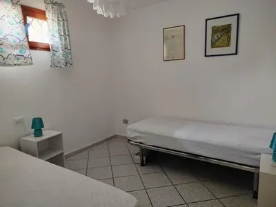 Letto o letti in una camera di Oasi Boungaville