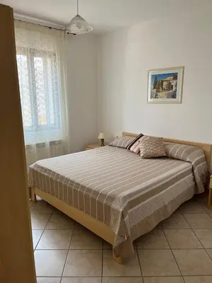 Letto o letti in una camera di Appartamento Il Ginepro