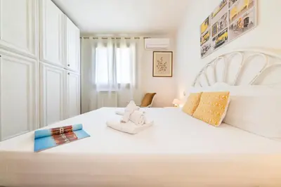 Letto o letti in una camera di NG Collection Krima