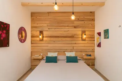 Letto o letti in una camera di Iknos Suites by Wonderful Italy