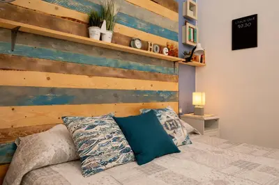Letto o letti in una camera di Iknos Suites by Wonderful Italy