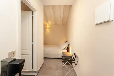 Letto o letti in una camera di B&B Il Glicine