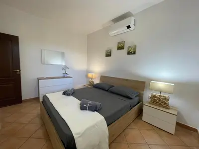 Letto o letti in una camera di Sa Domo