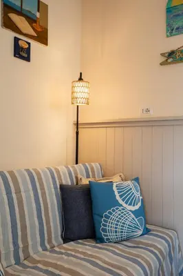 Area soggiorno di Mishti Blu Studio al Mare by Wonderful Italy