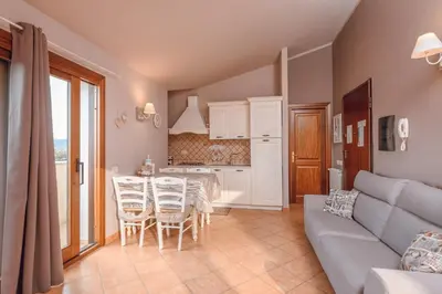 Cucina o angolo cottura di OLBIA SKYVIEW ATTIC, Gaia's House
