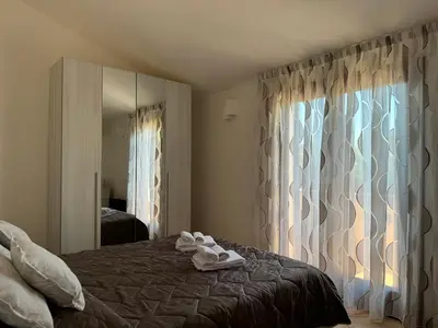 Letto o letti in una camera di Olbia Smeralda