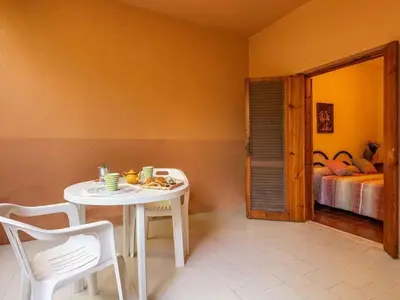 Letto o letti in una camera di Elegant Apartment near the Tyrrhenian Sea