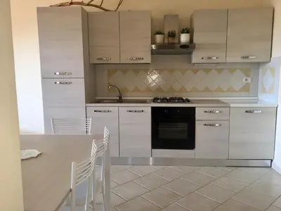Cucina o angolo cottura di La Perlacea fronte mare