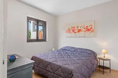 Letto o letti in una camera di Amazing Apartment -Sea & Island View-